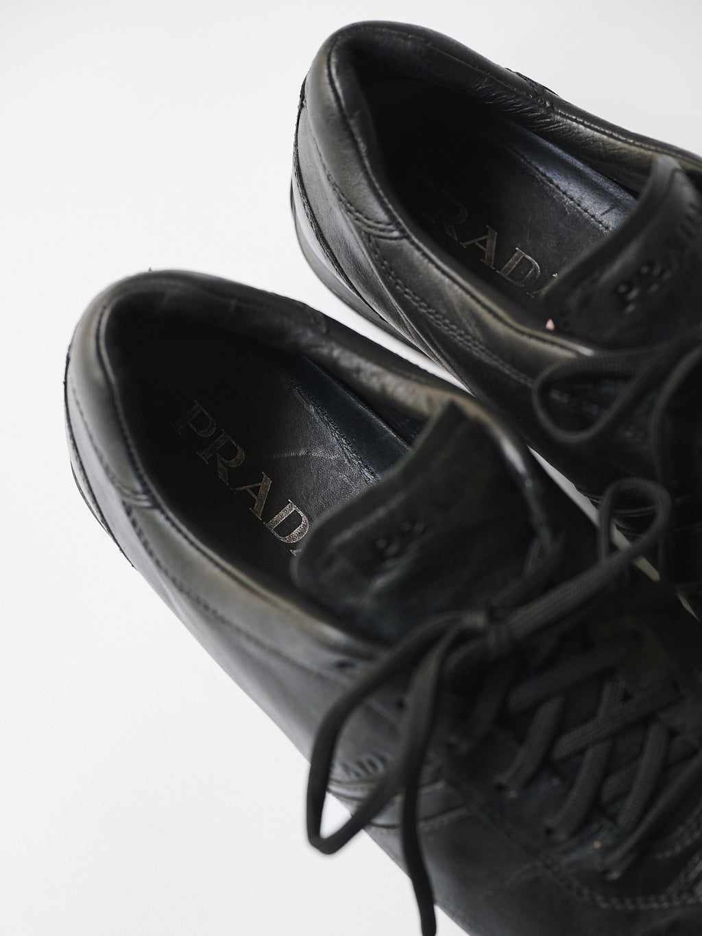 PRADA BLACK LOW TOP SHOES