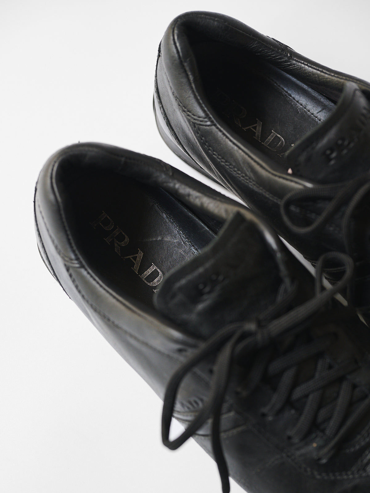 PRADA BLACK LOW TOP SHOES