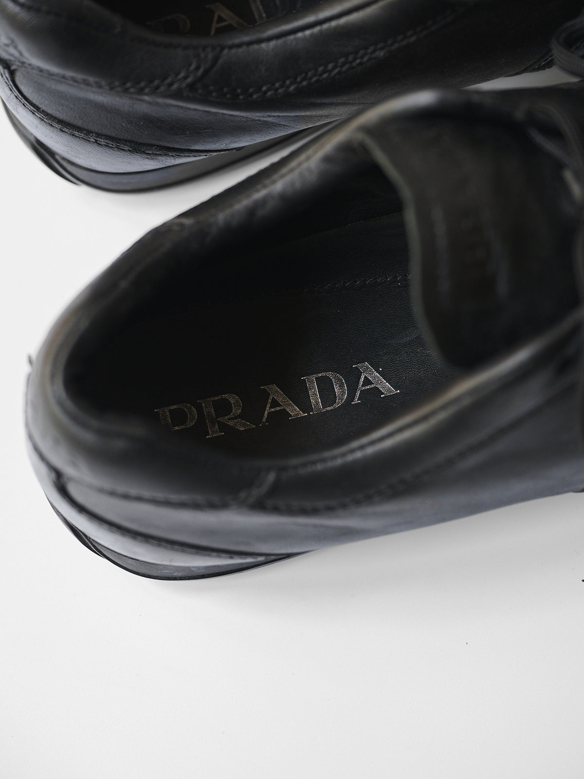 PRADA BLACK LOW TOP SHOES