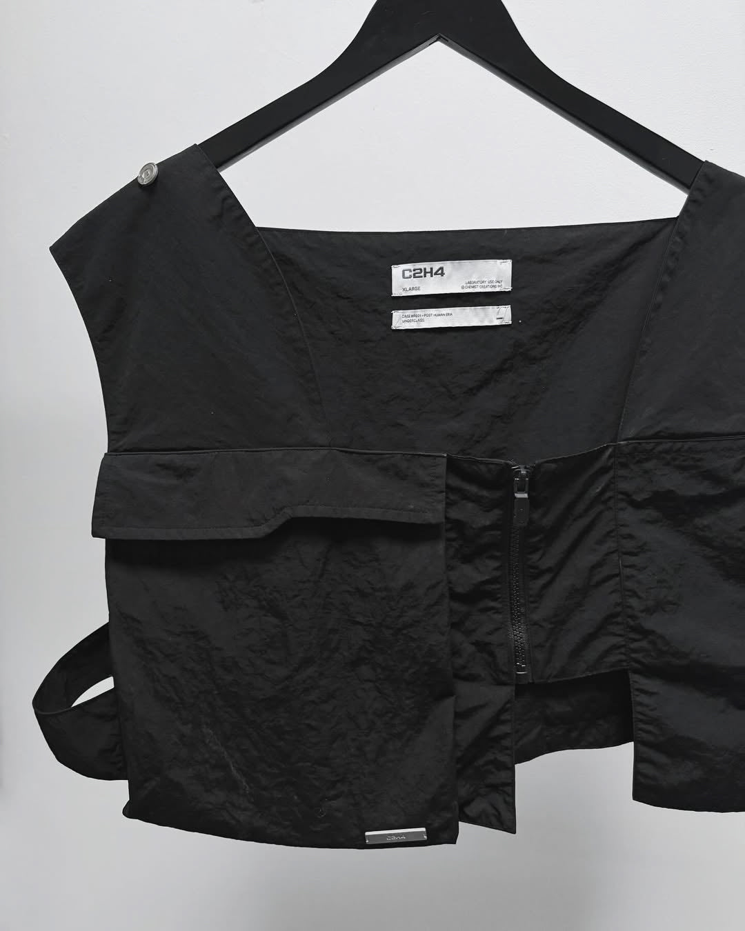 untilfaded-c2h4-vest-close-up-tag