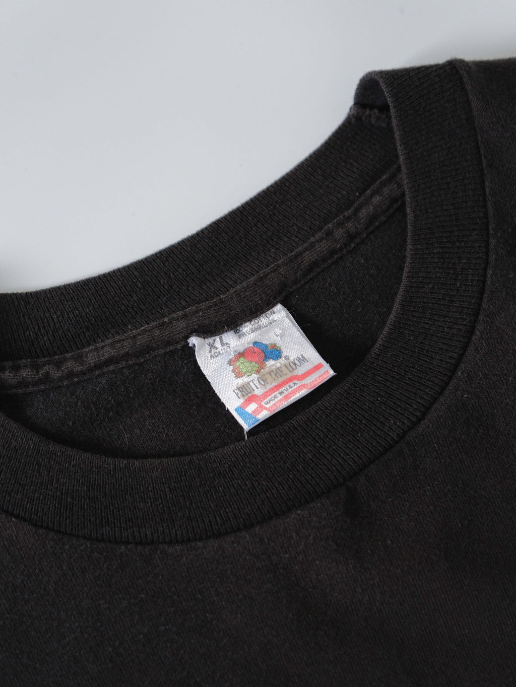 VINTAGE BLACK USE CONDOMS AD T-SHIRT